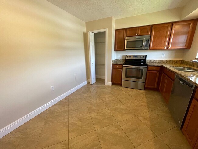 Building Photo - ANNUAL RENTAL - POINCIANA-2 BED-1 BATH