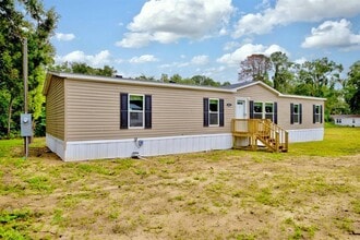 Building Photo - 8595 NW 13th Ct