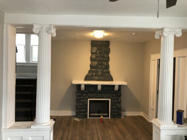 Electric Fireplace at entry - 3604 S Benton Ave