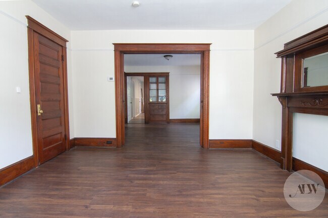 Living room with historic woodwork and built-in cabinets - 36 Parker Ave