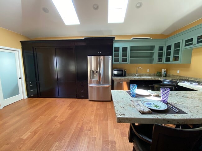 Murphy bed to maximize living space. - 10563 Cushdon Ave