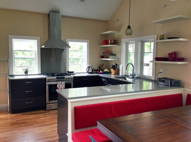 Chef’s kitchen with high-end appliances - 320 N Bozeman Ave