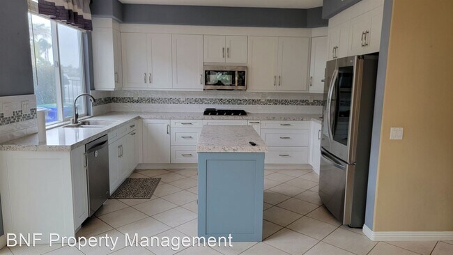 Building Photo - 5 br, 3 bath House - 1220 Abelia Ave