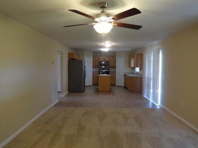 Building Photo - 5449 NW Wisk Fern Circle