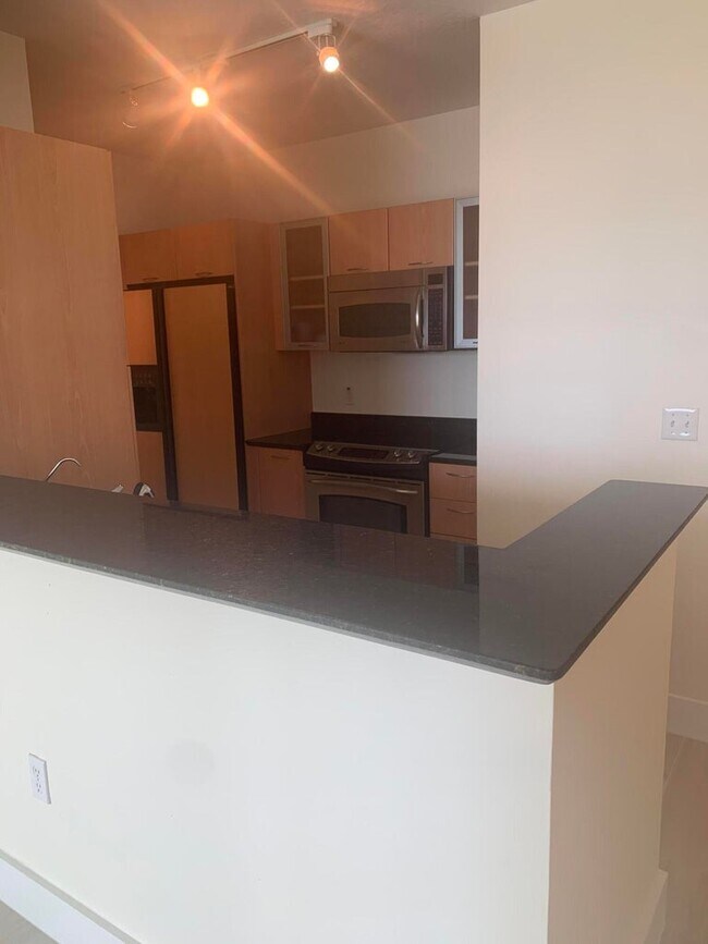 Photo - 100 NE 6th St Apartment