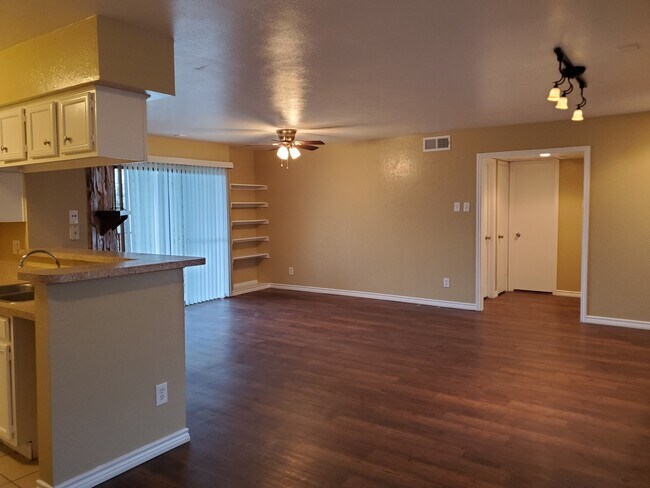 Living area with shelving - 5809 Lake Hubbard Pky