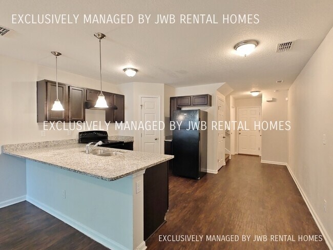 Foto del edificio - 8419 McGirts Village Ln