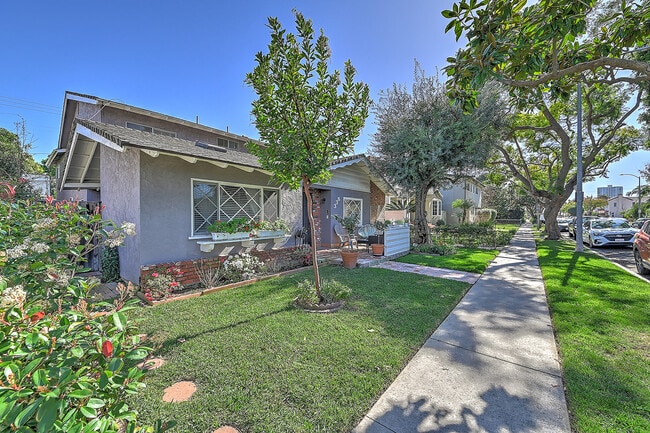 Sidewalk in front of 4 plex - 338 Orizaba Ave