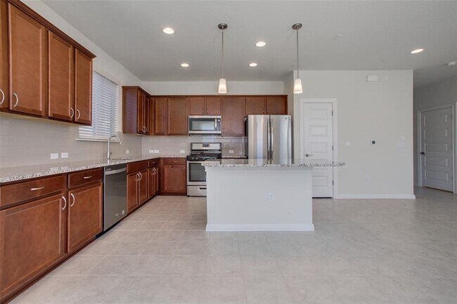 Building Photo - 9311 Gynerium Dr