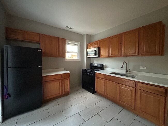 Foto del edificio - 6403 S Campbell Ave