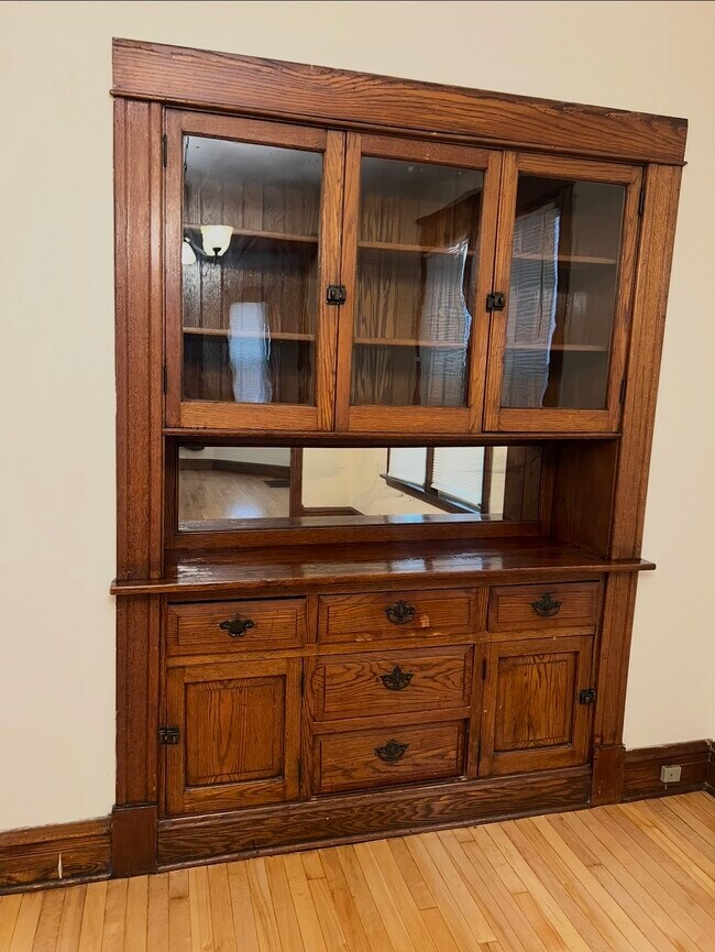 Dining room with a built-in hutch cabinet - 3748 W Lyndale St