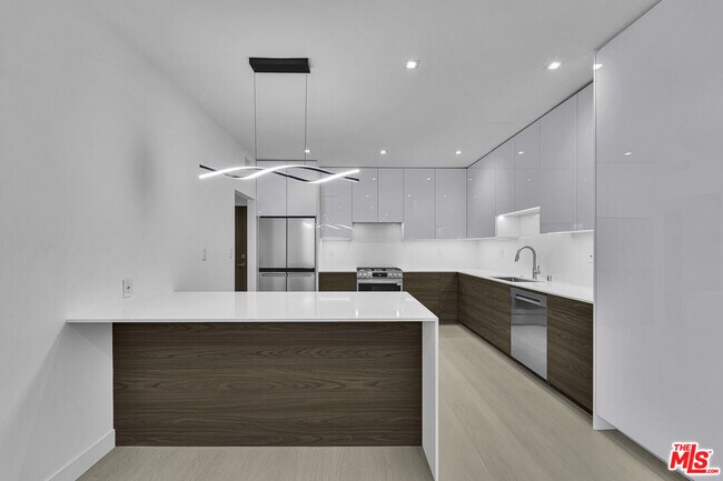 Building Photo - 10630 Wilkins Ave