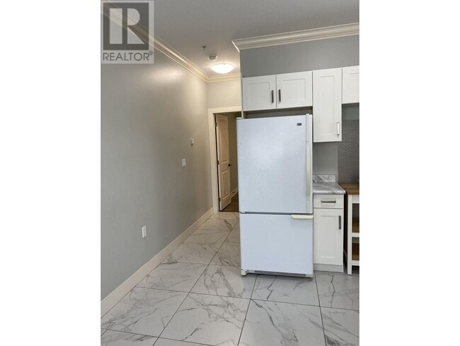 Photo du bâtiment - 717 E 61st Ave