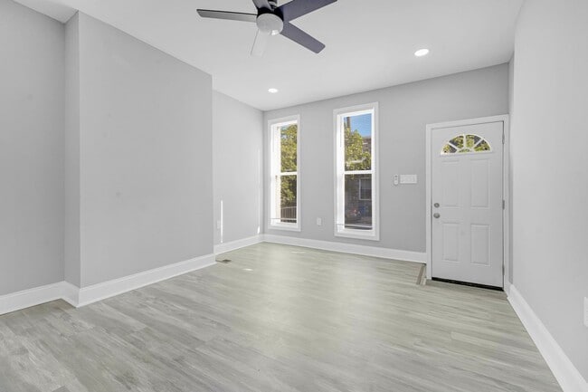 Building Photo - Stunning Fully Renovated 3-Bedroom, 3-Bathroom Row house in Prime Location.