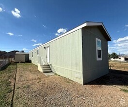 Building Photo - 8784 E Tracy Dr