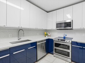 Building Photo - 10185 Collins Ave