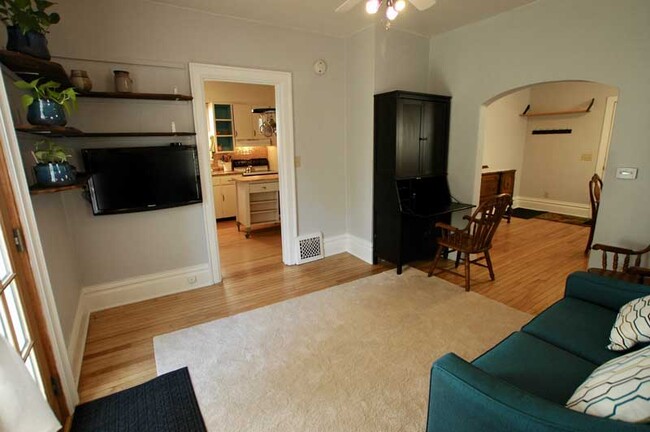 Living room with secretary desk - 310 Elmside Boulevard