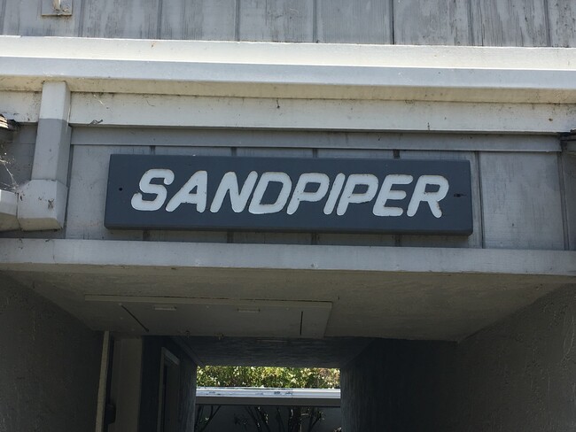 Building Photo - Cozy Studio by the Beach in Sandpiper III Complex!