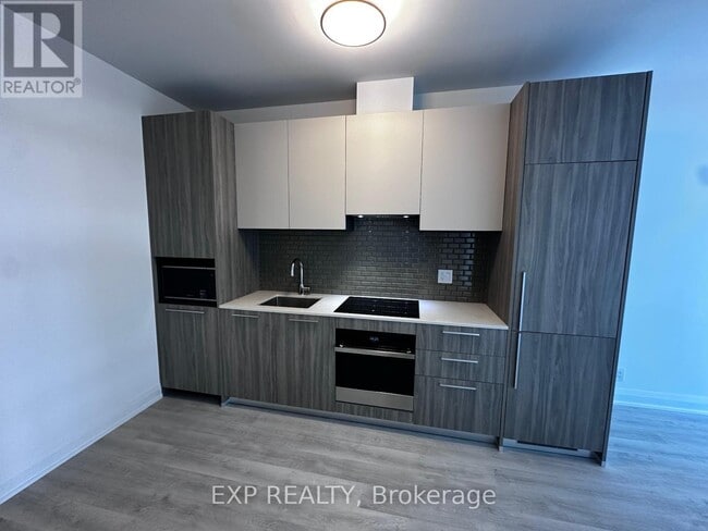 Building Photo - 65 Broadway Ave