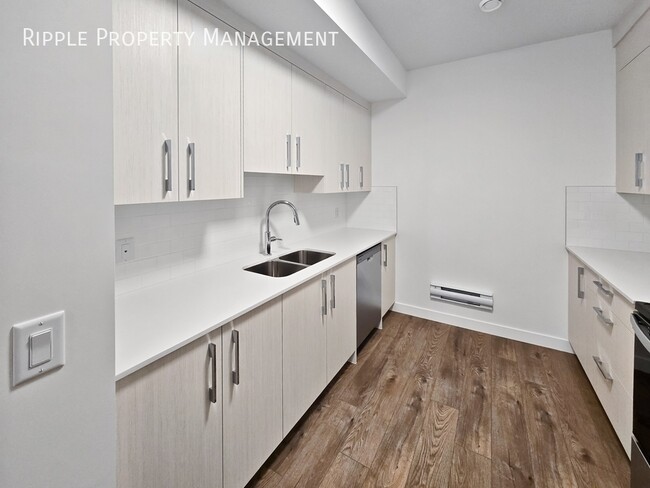 Photo du bâtiment - BRAND NEW 1 BED, 1 BATH BASEMENT SUITE | MODERN FINISHES | PRIVATE ENTRY