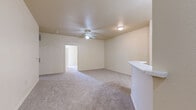 Located at 308 E Terrell Ave in Fort Worth, TX, this 2-bedroom, 2-bathroom residence offers a well-organized single-floor layout designed for comfortable everyday living. The kitchen features warm honey-toned wood cabinetry lining both walls, white appliances including a range and refrigerator, a built-in sink with countertop, and wood-look vinyl flooring that extends throughout the common areas, giving the space a cohesive and clean aesthetic. Both bedrooms are carpeted and finished with neutral tones, ceiling fans, and access to natural light through windows fitted with blinds. The primary bedroom provides a generous footprint, while the second bedroom offers comparable comfort and functionality. Each bathroom is appointed with oak-finish vanity cabinetry, a single-sink vanity with a white countertop, wood-look vinyl flooring, and well-lit mirrors. One bathroom includes a soaking tub and shower combination, while the other features overhead cabinetry for additional storage. A dedicated closet provides practical storage solutions. The overall palette of warm neutrals, consistent flooring materials, and ceiling fans throughout creates a tidy, functional living environment suited for a variety of lifestyles.