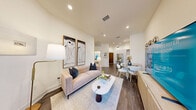 Located at 1881 N Rollins Rd in Burlingame, CA, this thoughtfully designed single-story residence offers a seamless blend of modern aesthetics and functional living. The open-concept layout unites the kitchen, dining, and living areas into one cohesive space, creating an inviting atmosphere ideal for both everyday living and entertaining. The kitchen is outfitted with flat-panel cabinetry in a soft gray finish, a subway tile backsplash, dark stone countertops, and stainless steel appliances, including a built-in microwave and freestanding range. Rich hardwood flooring flows throughout the main living areas, complementing the crisp white walls and recessed lighting overhead. The living area is bright and airy, with natural light streaming in through large windows and access to a private patio. The bedroom is a serene retreat, featuring hardwood floors, access to an outdoor balcony, and a generous walk-in closet with built-in shelving and hanging rods. The bathroom is finished with elegant marble-style tile on the walls and floors, and includes a full soaking tub with shower. Clean architectural lines, high ceilings, and a neutral palette give the entire residence a polished, contemporary feel.