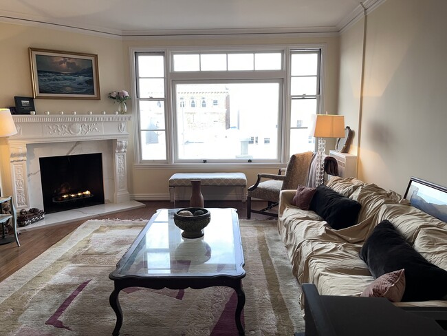 A beautiful warm living room to relax in, your private salon. - 1880 Jackson St