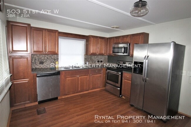 Building Photo - 503 51st Ave W