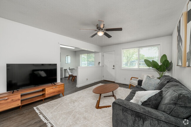 2BR, 2BA - 1,300SF - Living Room - 52 Flats Apartments