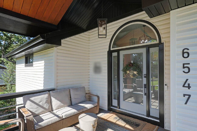 Building Photo - COMING SOON · Designer Renovation · Covered Deck Pavilion · 2-Car Garage · Lawn Care Included