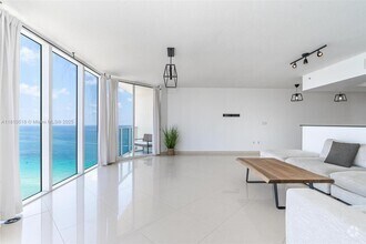 Building Photo - 16699 Collins Ave