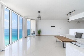 Building Photo - 16699 Collins Ave