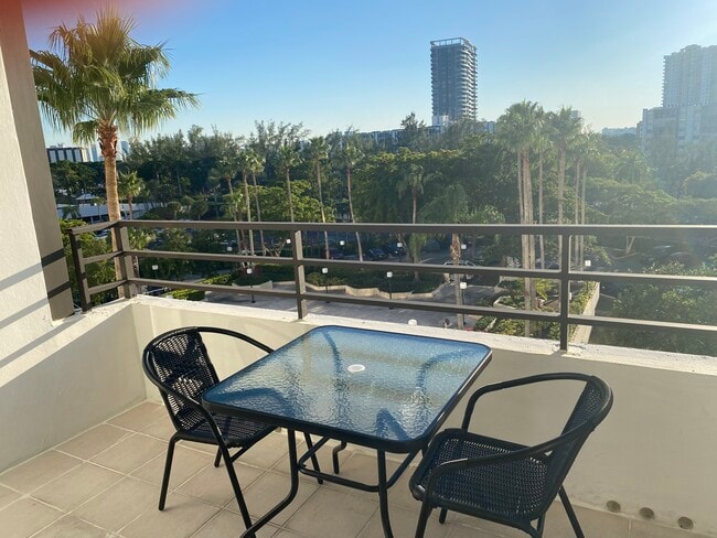 Balcony with solar lights - 500 Three Islands Blvd