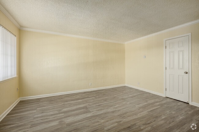 2BR, 1BA - 825SF - Living Room - Skyview Villa & Somerset Apartments