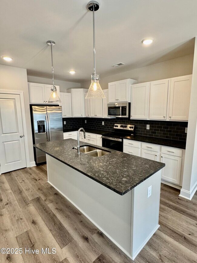 Foto del edificio - 1404 Hartley Ln