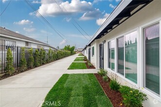 Building Photo - 13933 Doty Ave