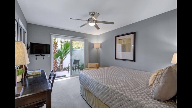 Guest bedroom with tv, private patio and awesome views of San Jacinto - 2522 S Sierra Madre