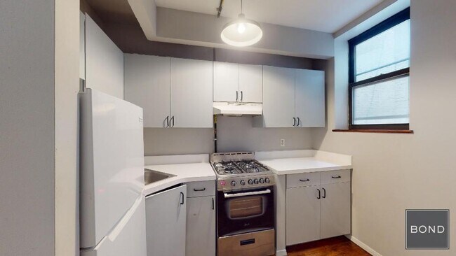 Foto del edificio - 221 E 23rd St
