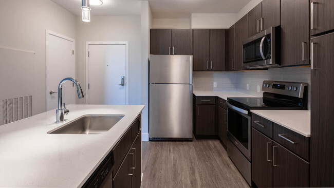 Kitchen with Stainless Steel Appliances - The Reserve at Burlington