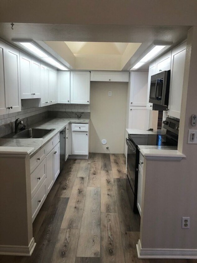Foto principal - Remodeled 2-Bed, 2-Bath Condo with Garage ...