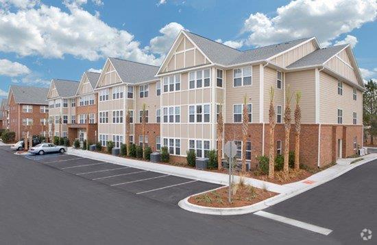 Building Photo - Seven Farms Village