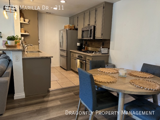 Building Photo - 9728 Marilla Dr