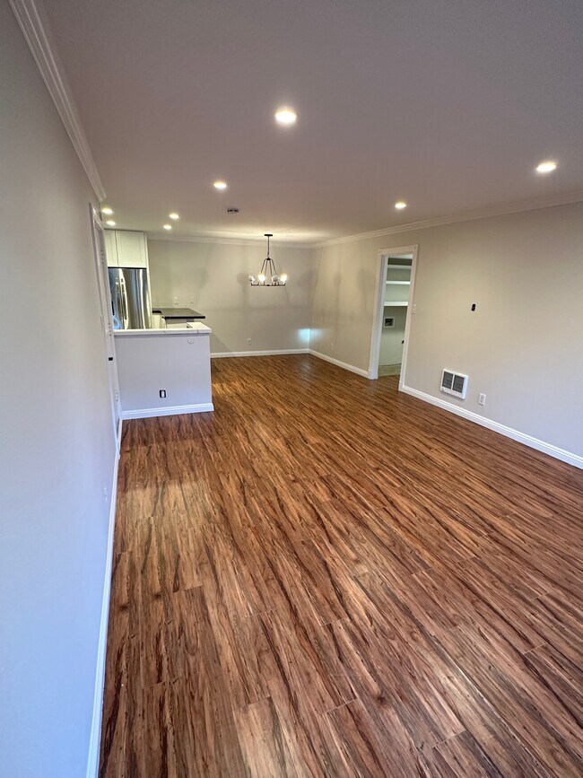 Living room and dining area - 5917 Armaga Spring Rd