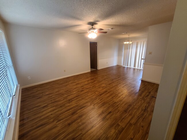 Open floor plan living room and dining area! - 1748 Port Dr