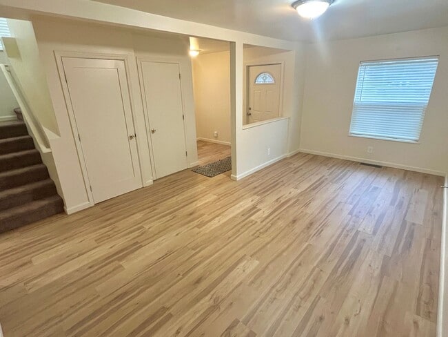Building Photo - Updated Cully Neighborhood 3 Bedroom Townhome with Hardwoods, Fully Fenced Yard