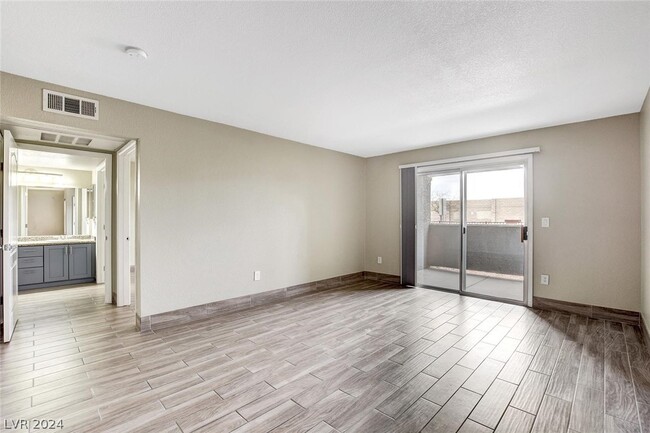 Building Photo - 5055 W Hacienda Ave