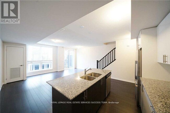 Building Photo - 1208 Main St E