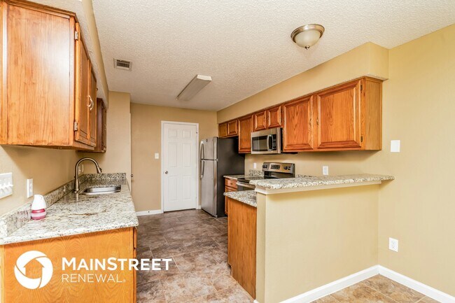 Foto del edificio - 1100 Stone Creek Dr