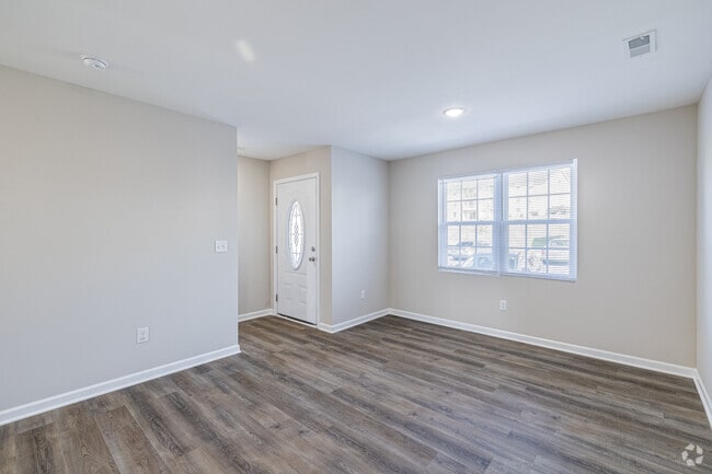 2BR, 1.5BA - 1,100SF - Living Room - Blue Ridge Luxury Townhomes