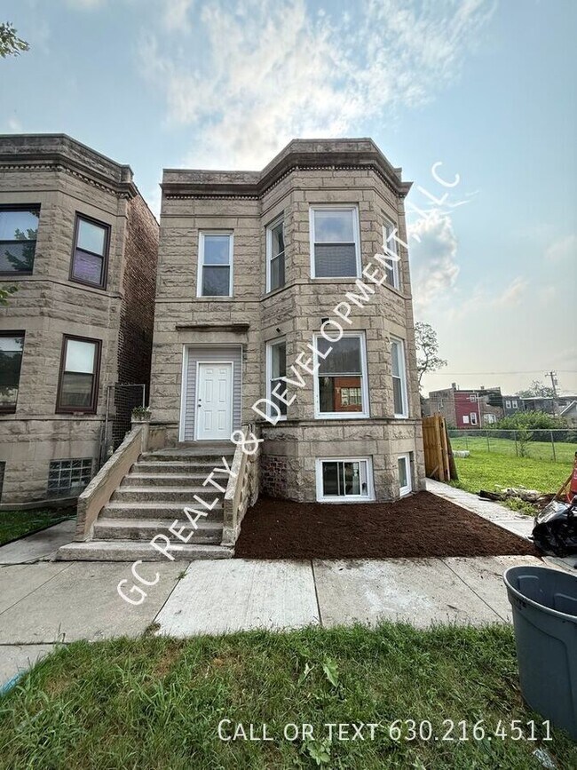 Building Photo - 6433 S Vernon Ave